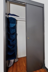 Your spacious closet with sliding doors provides ample storage for all your belongings during your stay.