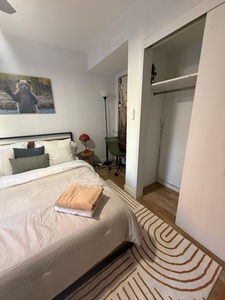 Unwind in your cozy bedroom featuring a comfortable bed, thoughtful decor, and ample wardrobe space for all your belongings.