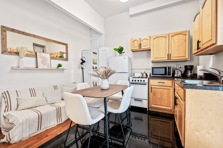 Your well-equipped kitchen awaits with everything you need to prepare meals, from modern appliances to a cozy dining nook perfect for morning coffee.