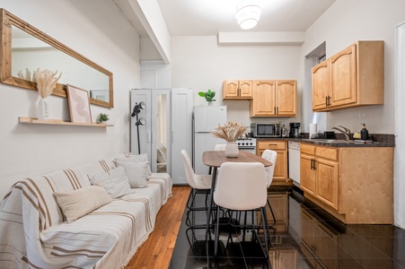 Unwind in your stylish open-plan haven, where natural wood tones and soft textures create the perfect home base for exploring.