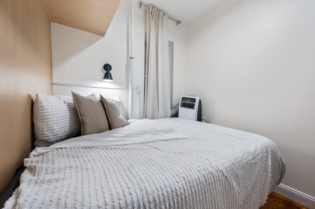 Drift into peaceful sleep in your cozy bedroom, where soft linens and thoughtful touches create the perfect retreat after exploring.