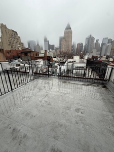Your private rooftop terrace offers stunning views of Manhattan's iconic skyline, perfect for morning coffee or evening relaxation.