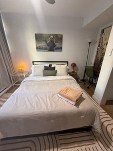 Drift off peacefully in your cozy bedroom, where soft lighting and comfortable bedding create the perfect sanctuary for restful nights.