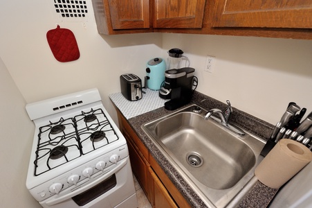 Your fully equipped kitchen awaits with everything needed to prepare home-cooked meals during your stay.