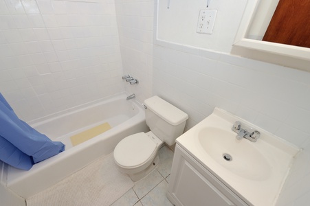 Step into your private sanctuary with a pristine white bathroom featuring everything you need to refresh and unwind after your adventures.