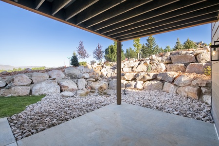 Mtn Shadow Lodge South-Patio Area with rock waterfall (East)