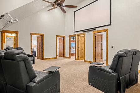 Gather everyone for movie night in this spacious theater room. Sink into plush recliners, dim the lights, and let the projector transport you to another world together.