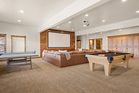 Gather your group for movie marathons, friendly pool games, and ping pong tournaments in this spacious entertainment room—where every evening becomes a memorable stay-in experience.
