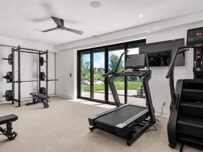 Your private fitness center features premium equipment and views of the surrounding landscape, making every workout feel refreshing and inspiring.