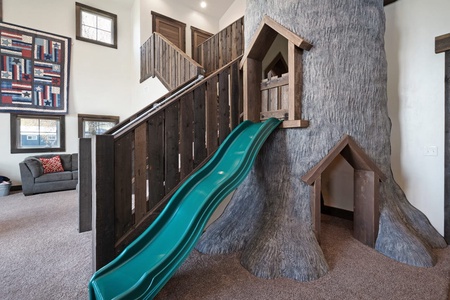 Barn-Treehouse slide in Family Room (Main Floor SW)