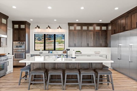 100 Acre Lodge-Kitchen Area with bar and seating for 9 (Main Floor West Center)