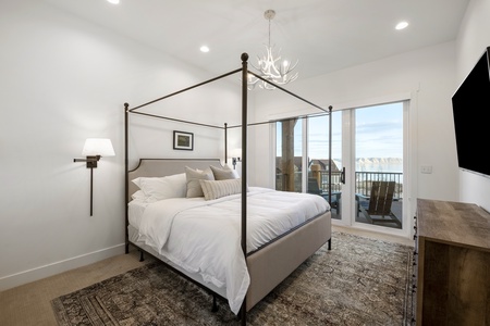 Black Timber Lodge-Master Bedroom with private entrance to deck.