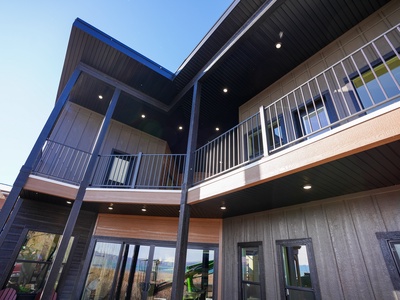 Modern multi-level property featuring sleek architectural design with spacious balconies and contemporary finishes throughout.