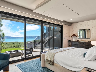 Wake to stunning lake and mountain views framed by floor-to-ceiling windows. Your private bedroom opens to a terrace where peaceful mornings and quiet evenings feel effortless.