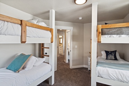 Golden Gable Lodge-Bedroom 2 (Upstairs): 2x Twin over Twin Bunk Beds (accommodates 4)