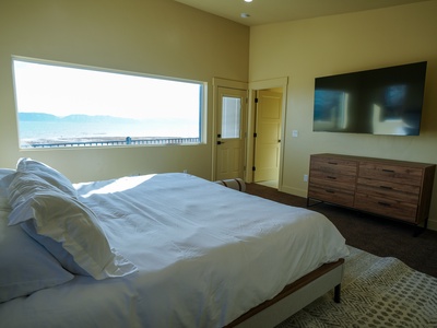 Wake up to stunning ocean views from your comfortable bed, with crisp linens and modern amenities creating the perfect seaside retreat.