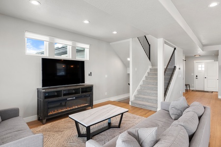 Harbor Haven-Family Room Area and stairs going up and down. (Main Floor SE)