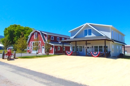 Cedar Farmhouse (white) and the Barn at Bear Lake (red)