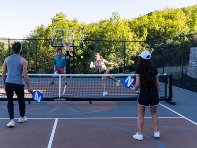 The on-site sports courts offer guests a fun way to stay active. Play pickleball or basketball amidst lush trees and fresh air.