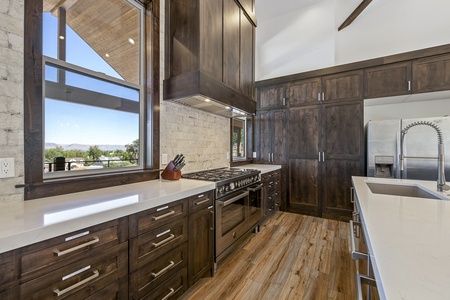 Mtn Shadow Lodge South-Kitchen Island and 6 burner gas stove (Main Floor East Center)