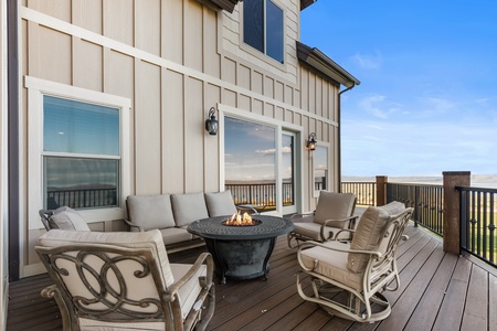 Averon Lodge - Bear Lake Luxury Rentals. Gather around the fire pit on your private deck, where plush seating and mountain views create perfect moments for conversation.