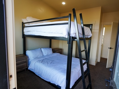 Your cozy bunk bed room offers comfortable sleeping for four, with crisp linens and convenient bedside storage.