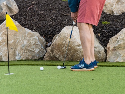 Perfect your short game on the property's miniature golf course, nestled among decorative boulders and landscaping for a fun outdoor challenge.