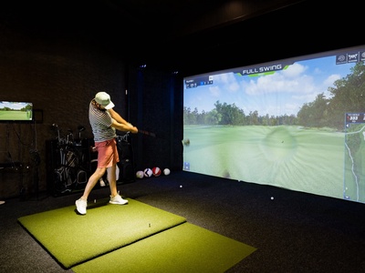 Challenge yourself on world-class virtual courses without leaving your vacation home—this full-swing golf simulator brings championship play right to your doorstep.