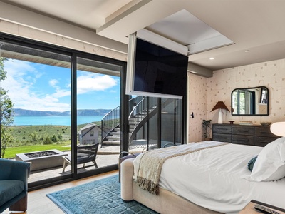 Wake up to breathtaking lake views framed by floor-to-ceiling windows, where your private balcony invites morning coffee moments overlooking serene waters and rolling hills.