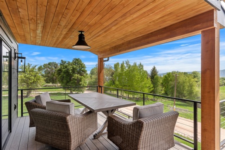 Mtn Shadow Lodge North-Relax on the deck and enjoy the views. (Main Floor East)