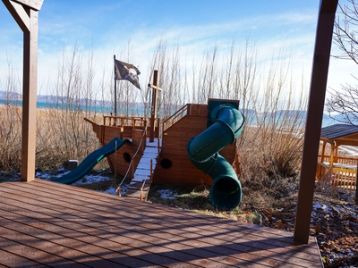 Your little pirates will love this adventurous playground ship with slides and climbing areas, perfectly positioned for waterfront fun.