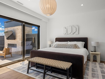 Slip into crisp linens and wake to sunlight streaming through the terrace doors. Your private outdoor space awaits just steps from bed, where morning coffee feels like a retreat.