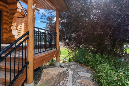 Green Canyon Chalet-Path down to yard from kitchen door.