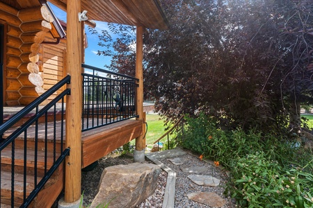 Green Canyon Chalet-Path down to yard from kitchen door.