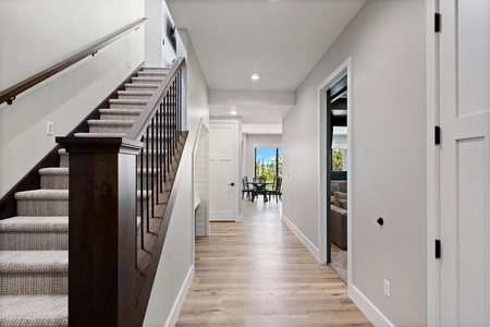 100 Acre Lodge-Stairs coming down into basement (West Center)