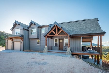 Shundahai Lodge-Front entrance to our home with paved driveway. (South Facing)