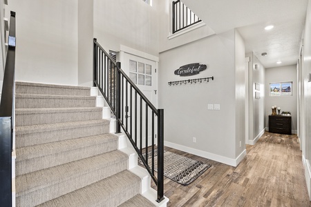 Sapphire Lodge-Entry and stairway to upstairs and downstairs (Main Floor West Center)