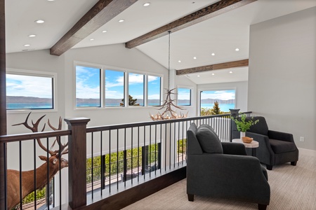 100 Acre Lodge-Seating area and overlook of great room below (Upstairs Center)