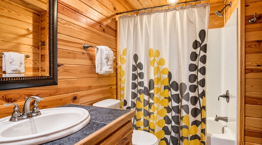 always-shady-cabin-hochatown-ok-bathroom-tub-shower