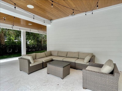 Poolside seating area is a great place to relax and enjoy the shade.