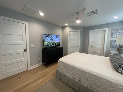Smart TV and walk-in closet, en-suite bath.