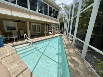The pool has access to a downstairs bathroom and cabana.