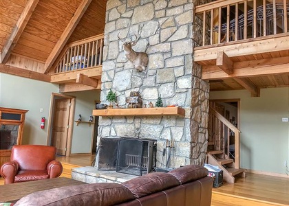 Living Room with Wood Burning Fireplace