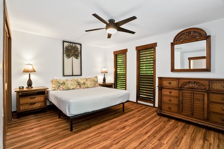 Simple comfort with a king bed, inspired by island vibes and rainforest dreams.