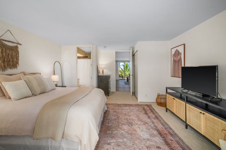 Designed with relaxation in mind, this peaceful retreat features a plush bed with high-quality linens, ensuring a restful night's sleep.