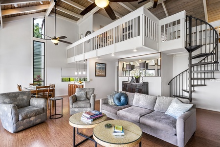 Open living area and upstairs loft with two twin beds