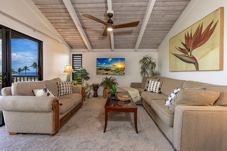 Living area includes a sleeper sofa to accommodate additional guests