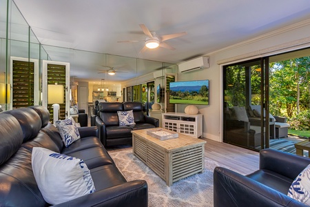 Cozy living room with TV and AC