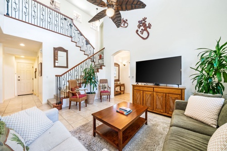 Vaulted ceilings in living area and large TV