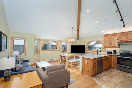 Spacious living room with vaulted ceilings and amazing views of Ballard Peak